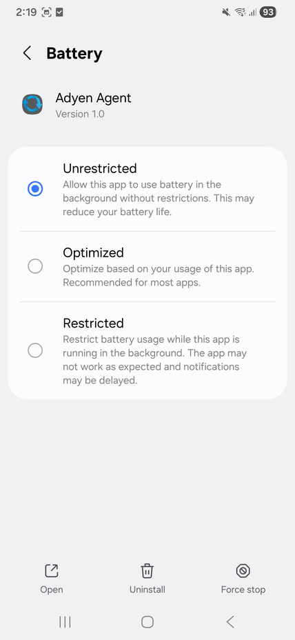 Android Battery settings screen for the Adyen Agent app with the Unrestricted option selected.
