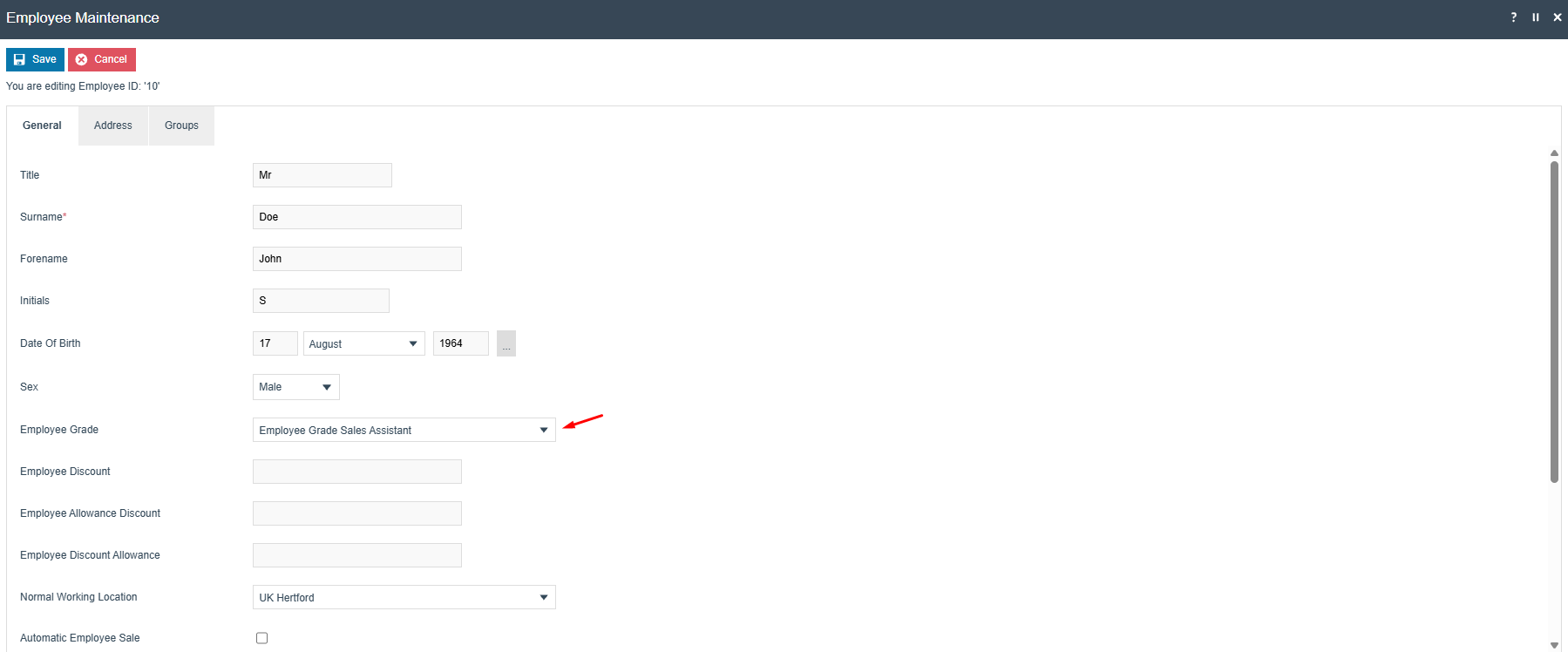 Employee record showing Employee Grade dropdown with a grade selected.